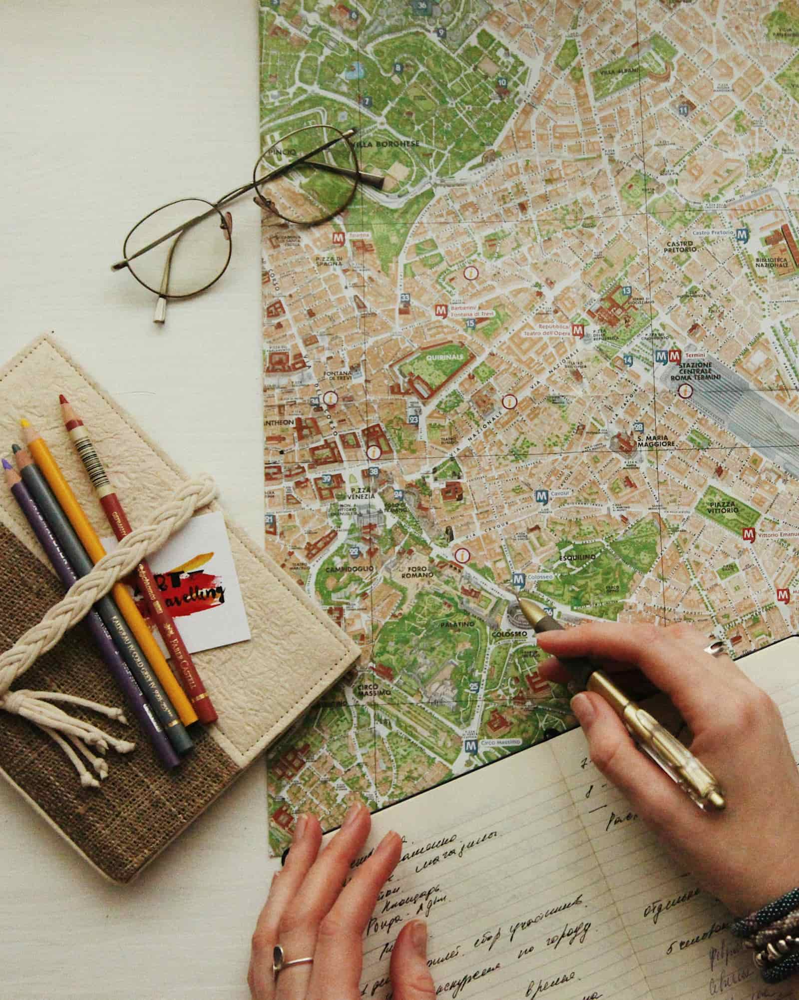 Map and eyeglasses representing lead generation for travel advisors