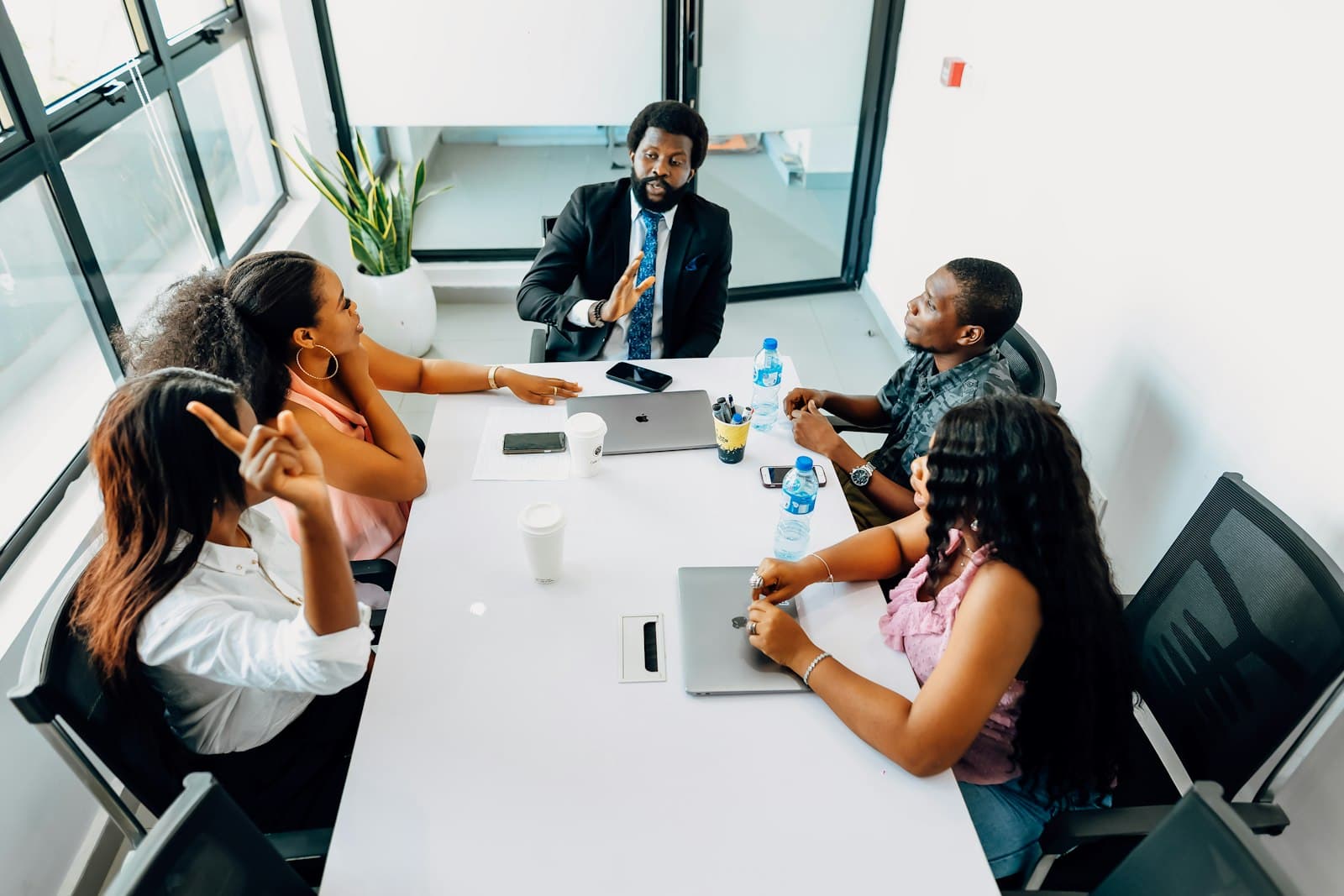 A group planning session around a table, the kind of practice that turns a script into a rep you've handled before A group planning session around a table, the kind of practice that turns a script into a rep you've handled before