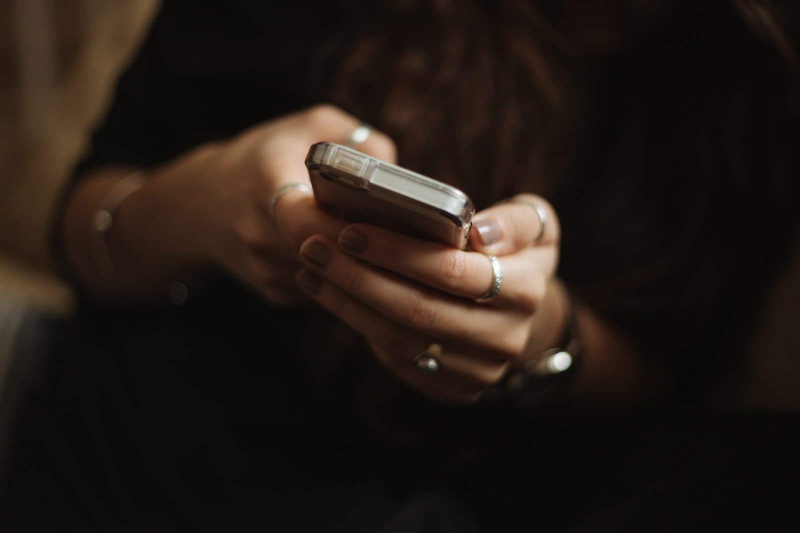 Scrolling social media on a smartphone, the kind of Facebook group where a good referral thread starts Scrolling social media on a smartphone, the kind of Facebook group where a good referral thread starts